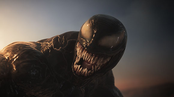 A muscular, black symbiotic creature with large white eyes and sharp, jagged teeth.