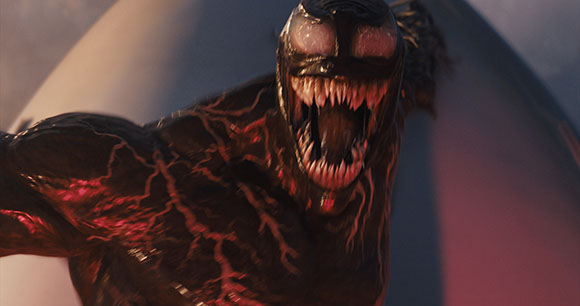 A muscular black creature with white eyes and sharp teeth snarls with its mouth wide open.