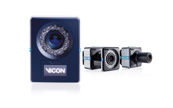 Three black Vicon motion capture cameras against a white background.
