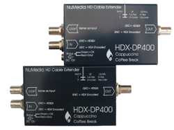 Two black NuMedia HDX-DP400 cable extenders with various input and output ports.