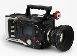 A black professional digital cinema camera with a large lens and a top handle.
