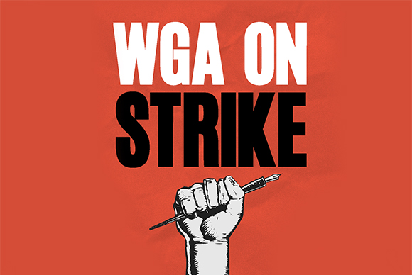Red background with white text reading WGA ON STRIKE above a black and white illustration of a fist holding a pen.
