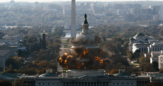 A large explosion with dark smoke and orange flames erupting around the dome of the U.S. Capitol building.