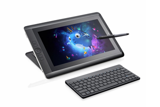A black digital graphics tablet displaying colorful character art, a stylus, and a small keyboard.