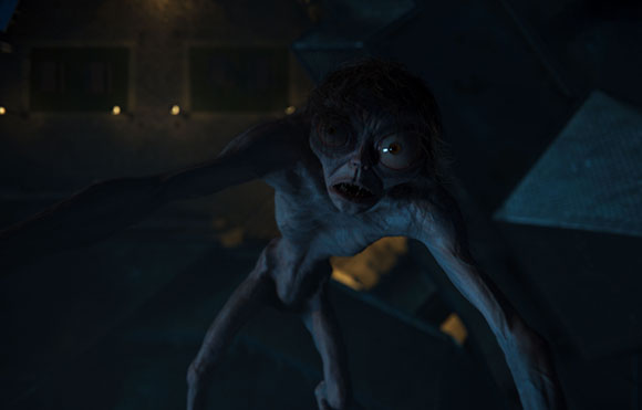 A pale, emaciated creature with large, wide eyes and thin limbs lunges forward in a dark setting.