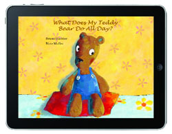 A tablet shows a book cover with a cartoon teddy bear wearing blue overalls on a yellow background.