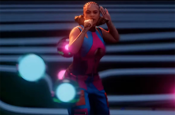 A woman in a pink and blue outfit performs on a stage with glowing blue and pink lights.