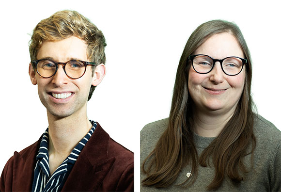 A man with glasses and a woman with long hair smiling against a white background.