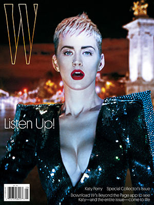 Katy Perry with short blonde hair and red lipstick wearing a black sequined outfit against a city night background.