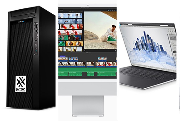 A black desktop tower, an all-in-one computer displaying video editing software, and a laptop showing architectural blueprint