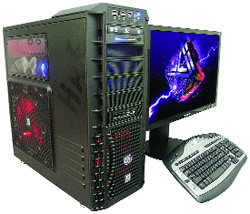 Black gaming PC tower with red lighting, a monitor displaying a graphic, and a keyboard.