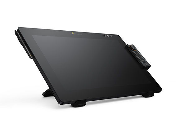A large black digital writing tablet propped up on a stand against a white background.