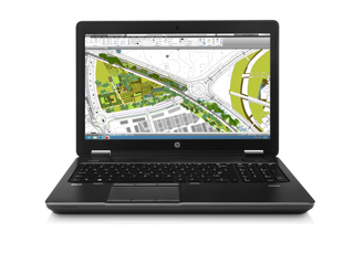 A black HP laptop open on a white background, displaying a colorful landscape architectural plan on the screen.