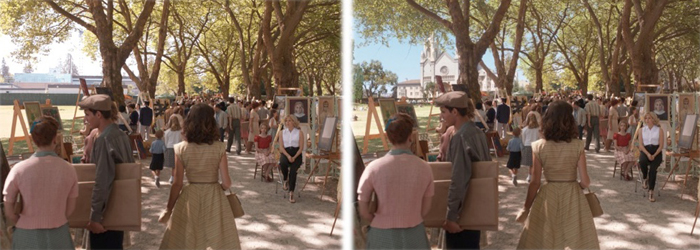 People walking through a sunlit park lined with large trees and art easels.