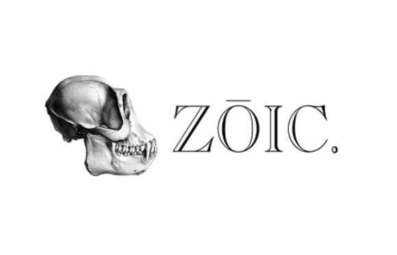 Black and white sketch of a primate skull next to the text 'ZŌIC.'