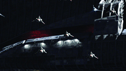 Several small spacecraft fly alongside a massive, dark spaceship in deep space.