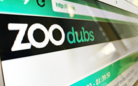 The white and green Zoo Dubs logo displayed on a computer monitor.