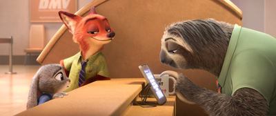 An orange fox and a small gray rabbit watch a sloth slowly use a computer at a service desk.