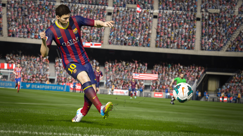 A soccer player in a blue and red striped jersey kicks a soccer ball on a field in a crowded stadium.