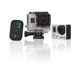 GoPro HERO3 action camera, a waterproof housing, and a handheld remote control on a white reflective surface.