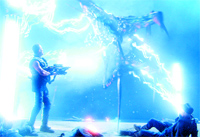 A man stands holding a large weapon as bright blue energy streaks across a dark scene.