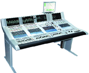 A large digital audio mixing console with multiple faders, knobs, and integrated display screens.