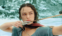 A woman with dark hair aims a bow and arrow against a snowy, icy background.