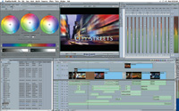 Video editing software interface with color wheels, a preview window, and a multi-track timeline.