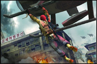 A person in a yellow jacket and red helmet hangs from the underside of a large aircraft over a city.