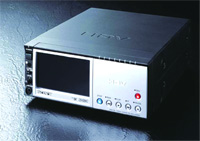 A black rectangular electronic device featuring a small display screen and several control buttons on the front.