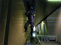 A character in dark clothing climbs a narrow wall in a dimly lit, futuristic corridor.