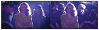 Two similar shots of a woman with wavy hair wearing a yellow jacket amidst a crowd at night.
