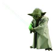 A small green creature in tan robes holding a glowing green lightsaber.