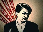 High-contrast portrait of a man with dark hair and a mustache against red and white text banners.