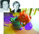 Black and white portraits of two people above a bright orange 3D animated fish in a teal teapot.