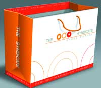 A white and orange rectangular box featuring The Syndicate logo and branding.