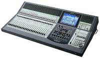 A professional digital audio mixing console with numerous sliders, knobs, and a central digital display screen.