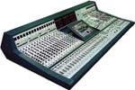 A large professional audio mixing console with numerous sliders, knobs, and buttons.