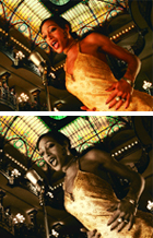 A woman in a gold dress sings into a vintage microphone under a stained glass ceiling.