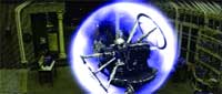 A bright blue glowing sphere containing a complex metallic mechanical structure in a dark interior.