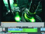 A computer monitor showing a dark 3D digital model with glowing green lights above a software interface.