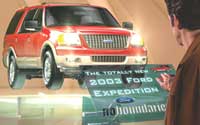 A man views a large advertisement featuring a red 2003 Ford Expedition SUV.