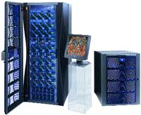 A large server rack with blue lights, a small monitor on a clear stand, and a smaller server unit.