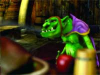 A green, goblin-like creature with pointed ears wearing a purple cape in a dimly lit room.
