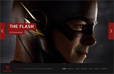 Profile view of a man wearing a dark red superhero mask and suit with a yellow lightning bolt emblem.
