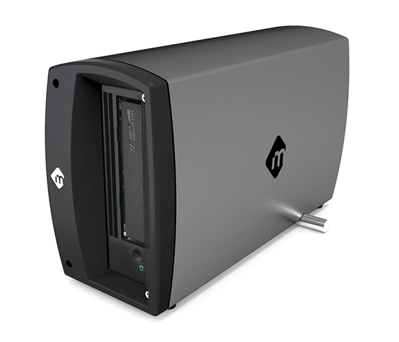 A gray rectangular external hard drive enclosure with a black front panel and a drive inserted.