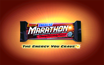 A Snickers Marathon long lasting energy bar centered against a glowing orange and red background.