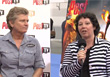 Two women in separate frames, one in a grey shirt and one in a striped shirt holding a microphone.