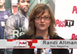 Randi Altman of Post Magazine speaking in front of a Post TV backdrop.