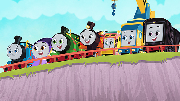 A row of diverse, smiling cartoon trains and a crane on a track against a blue sky.